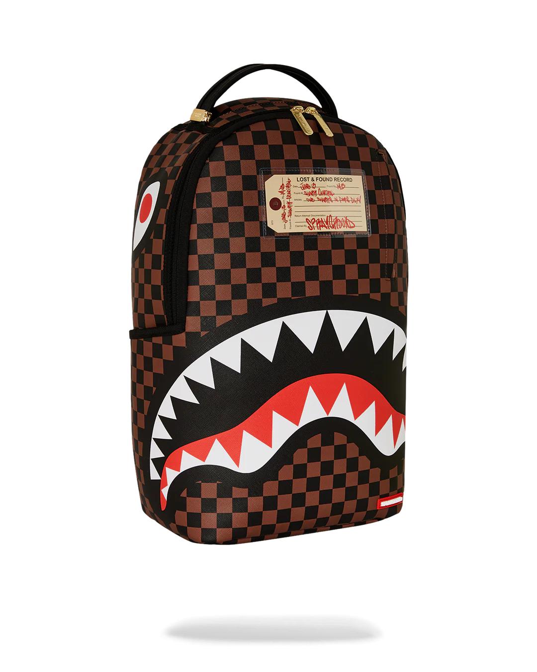 Sprayground Best Seller | SHARKS IN PARIS LOST & FOUND BACKPACK