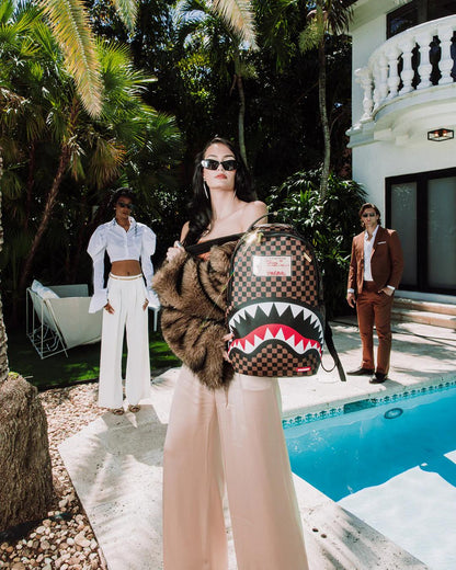 Sprayground Best Seller | SHARKS IN PARIS LOST & FOUND BACKPACK