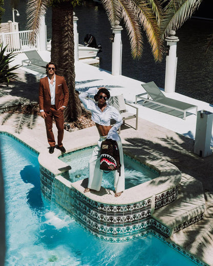 Sprayground Best Seller | SHARKS IN PARIS LOST & FOUND BACKPACK
