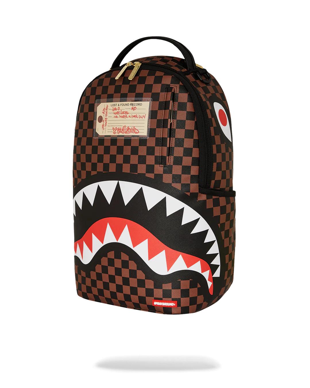Sprayground Best Seller | SHARKS IN PARIS LOST & FOUND BACKPACK