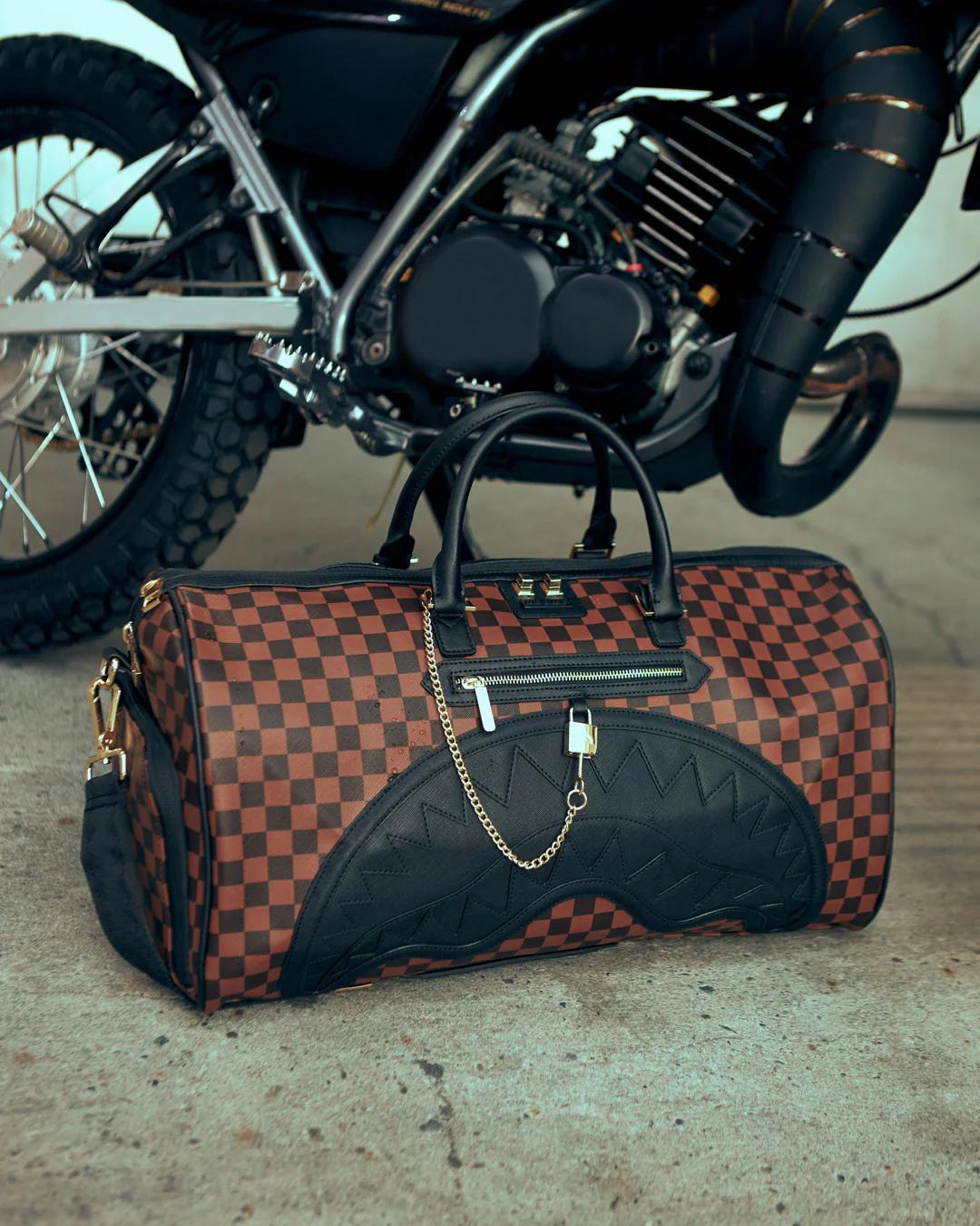 Sprayground Best Seller | HENNY LOCK SHARKS IN PARIS DUFFLE