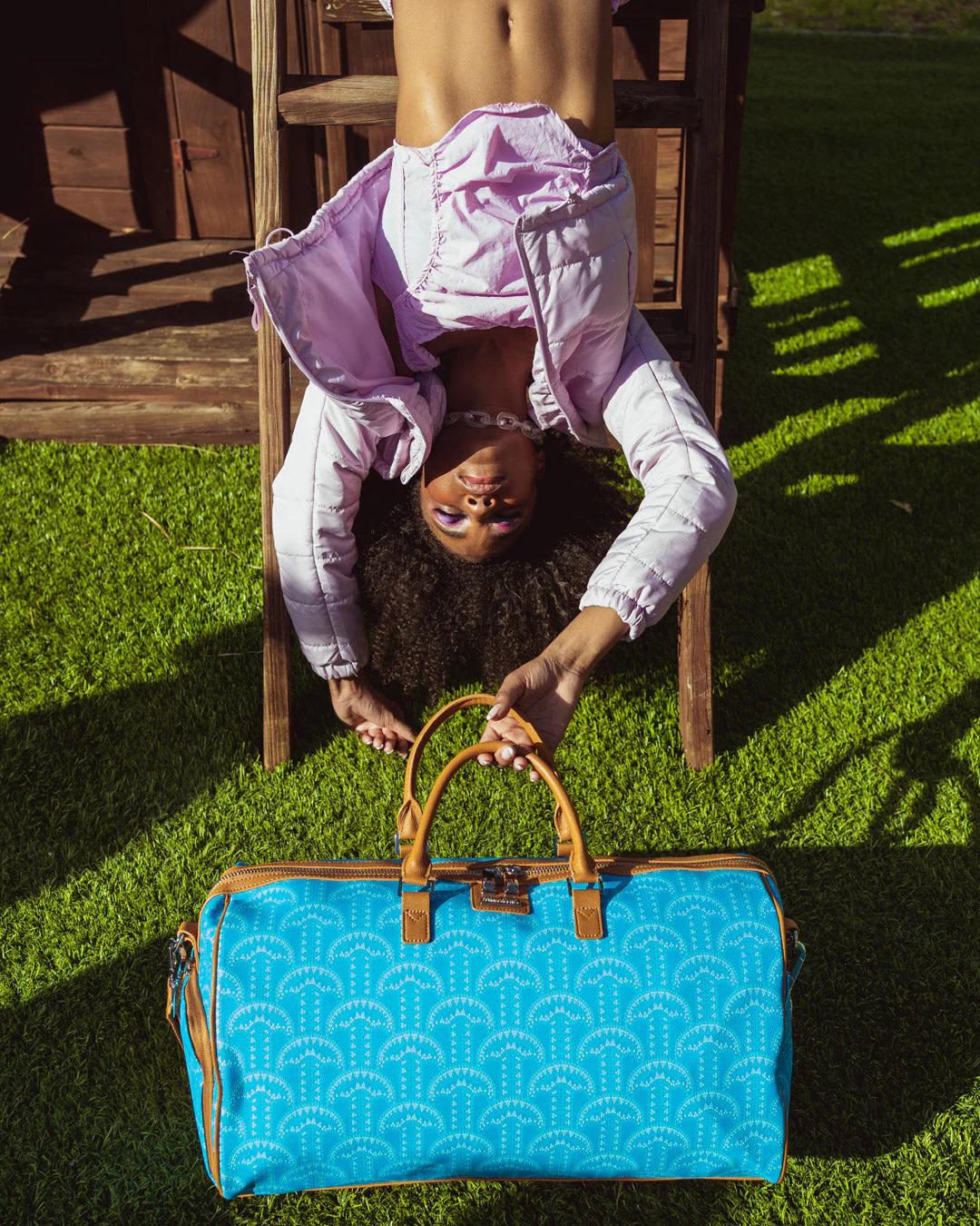 Sprayground Trending | ILLUCHAINS TURQ DUFFLE