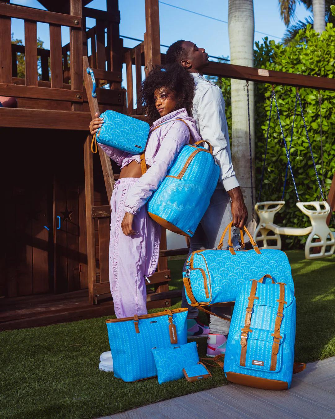 Sprayground Trending | ILLUCHAINS TURQ DUFFLE