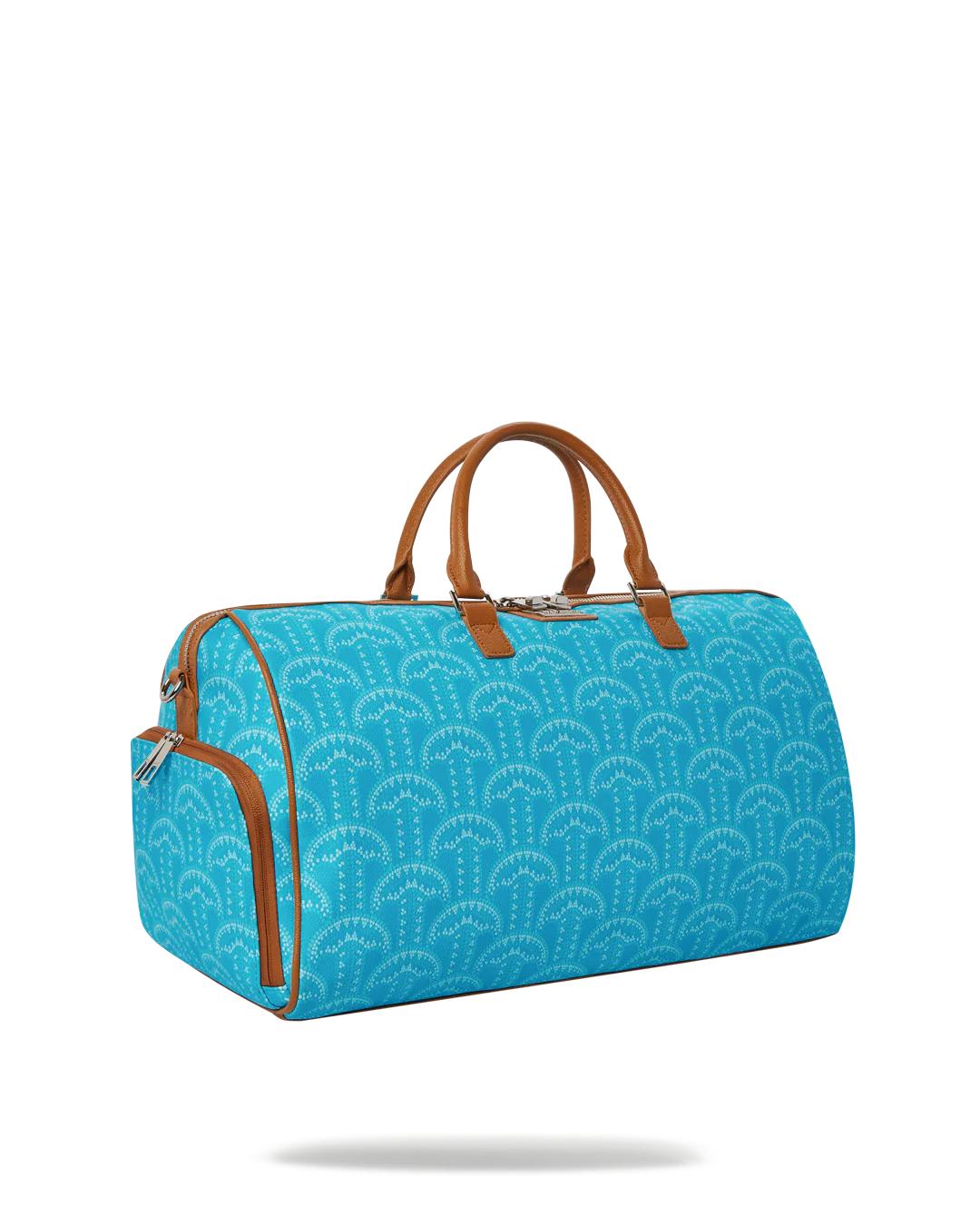 Sprayground Trending | ILLUCHAINS TURQ DUFFLE