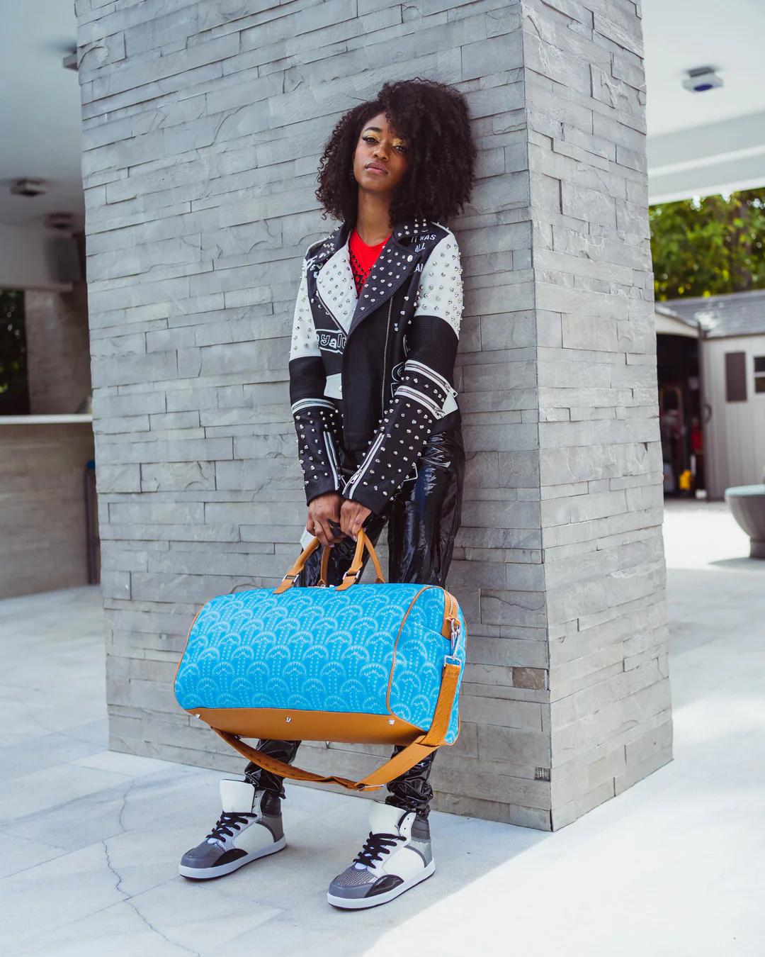 Sprayground Trending | ILLUCHAINS TURQ DUFFLE