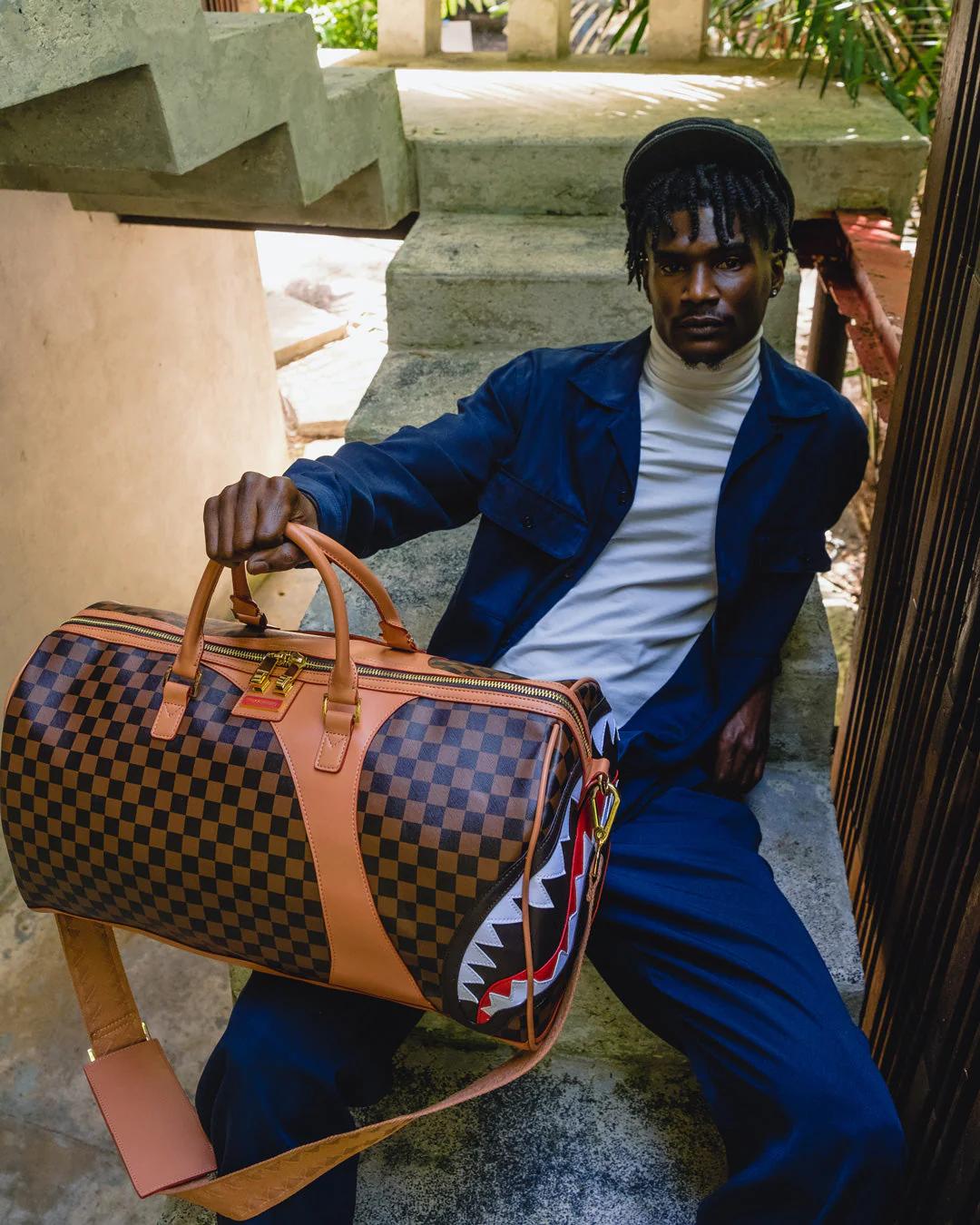 Sprayground Signature | HENNY AIR TO THE THRONE DUFFLE