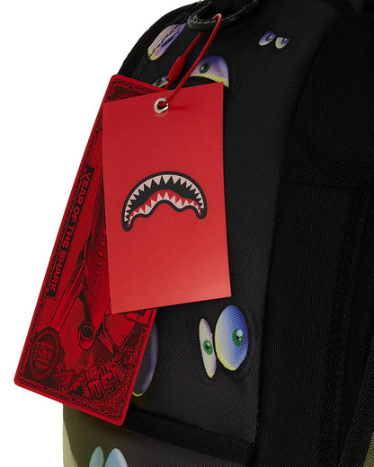 Sprayground Best Seller | EYES ALL A GLOW (GLOW IN THE DARK) DLXR BACKPACK