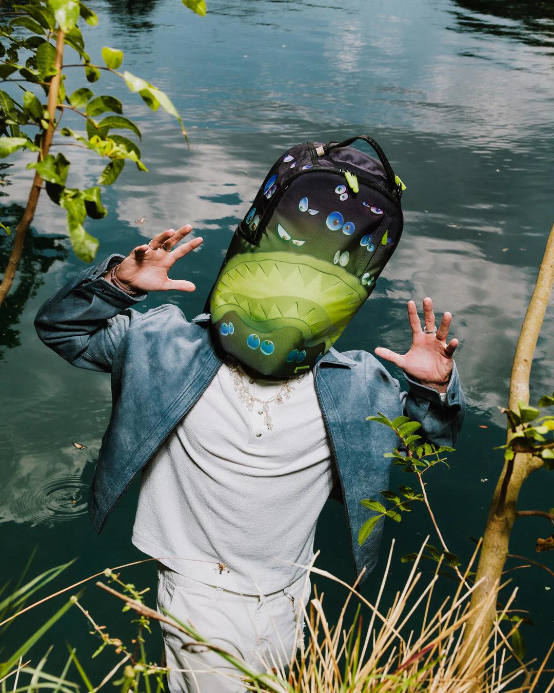 Sprayground Best Seller | EYES ALL A GLOW (GLOW IN THE DARK) DLXR BACKPACK