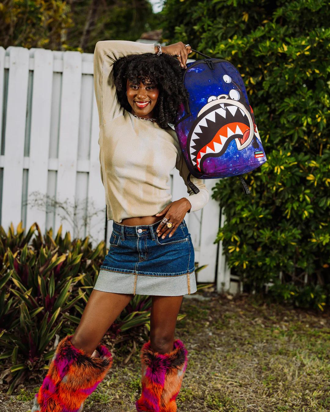 Sprayground Best Seller | FUTURAMA NIBBLER EAT SHARK DLXR BACKPACK