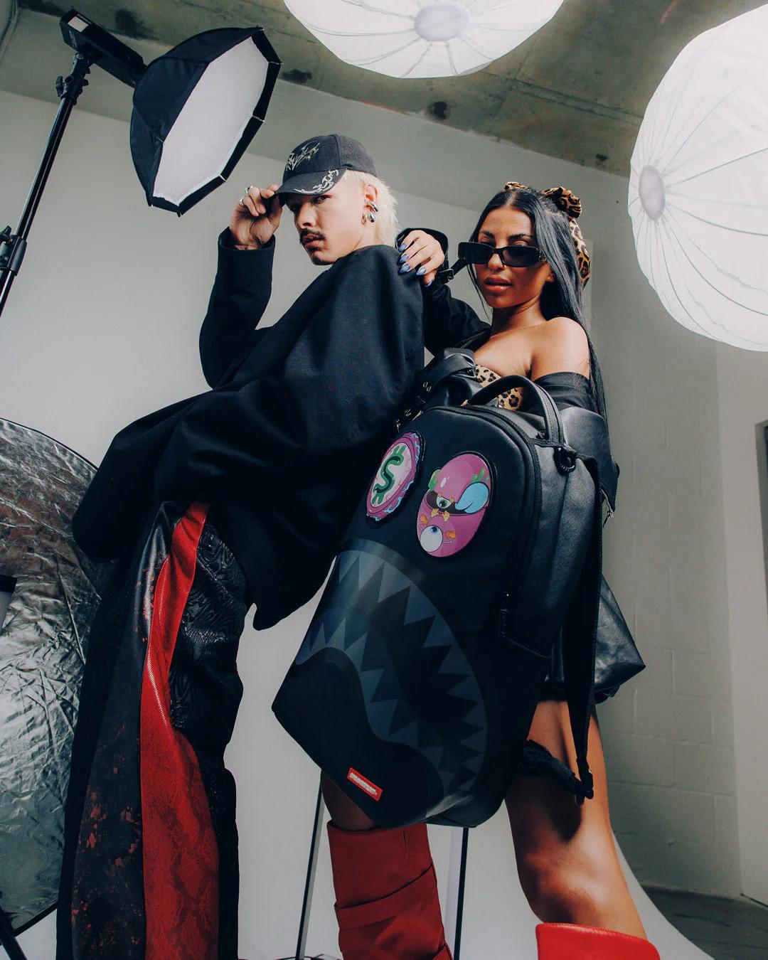 Sprayground Essential | SPLIT SAINT VELCRO REMOVABLE 6 EYES SHARK BACKPACK