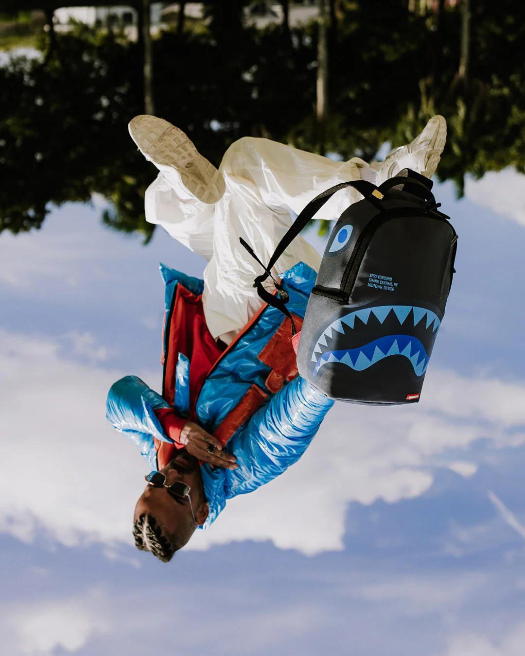 Sprayground Signature | SHARK CENTRAL LATE ARRIVAL DLXSV BACKPACK