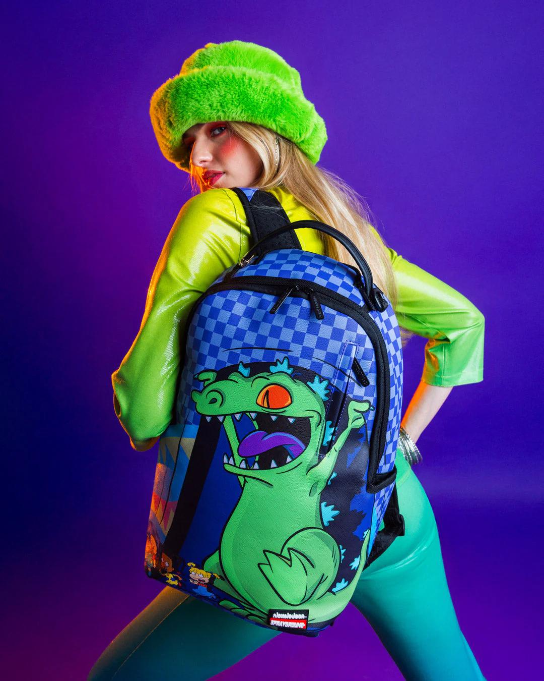 Sprayground Trending | RUGRATS REPTAR CHASE DLXSV BACKPACK