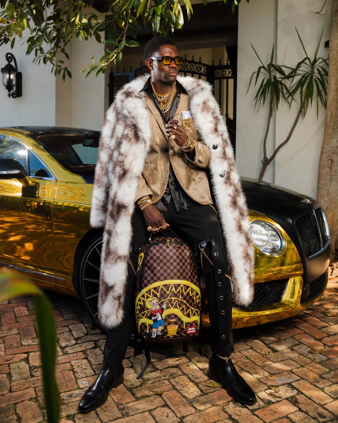 Sprayground Essential | RICHIE RICH PAINT THE SHARK GOLD BACKPACK