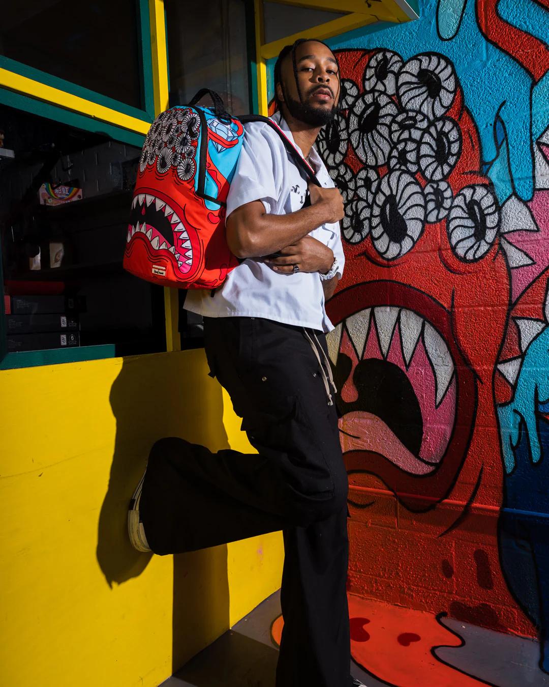 Sprayground New | JORGE RODRIGUEZ THE ARTIST COLLAB BLINKY SHARK BACKPACK