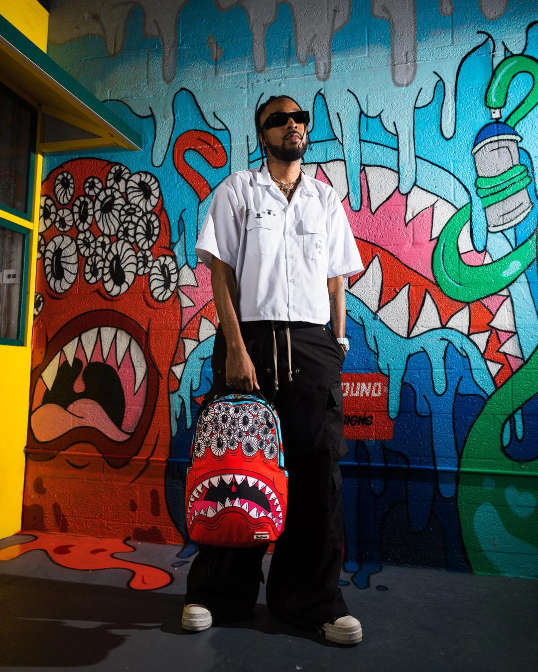 Sprayground New | JORGE RODRIGUEZ THE ARTIST COLLAB BLINKY SHARK BACKPACK