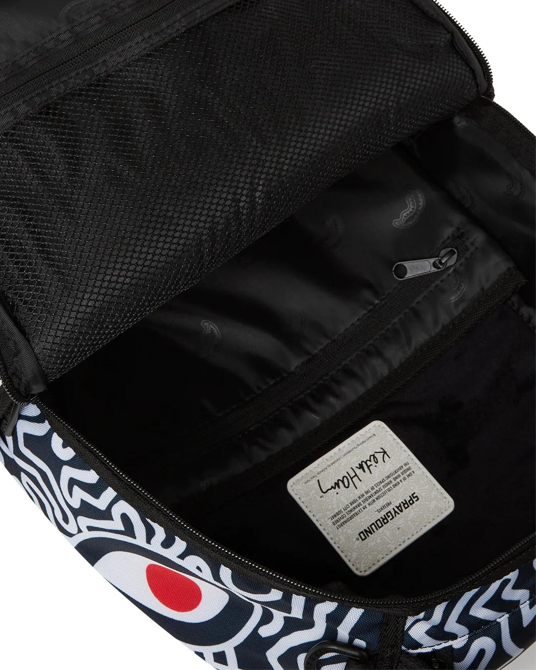 Sprayground Featured | KEITH HARING SKATER SHARK DLXSR BACKPACK