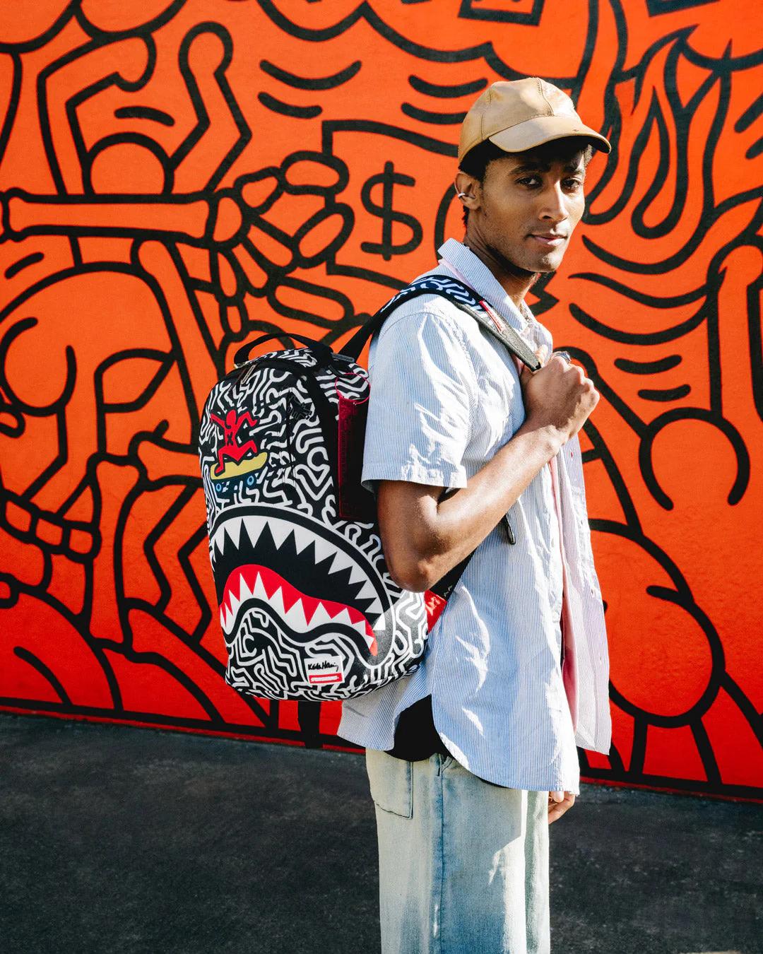 Sprayground Featured | KEITH HARING SKATER SHARK DLXSR BACKPACK