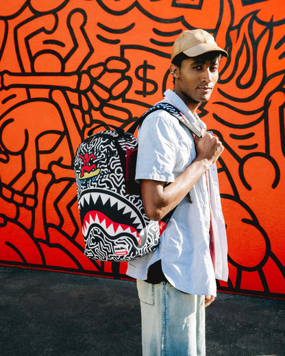 Sprayground Featured | KEITH HARING SKATER SHARK DLXSR BACKPACK