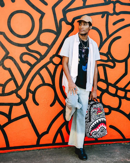 Sprayground Featured | KEITH HARING SKATER SHARK DLXSR BACKPACK