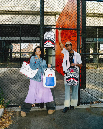 Sprayground Featured | KEITH HARING SKATER SHARK DLXSR BACKPACK