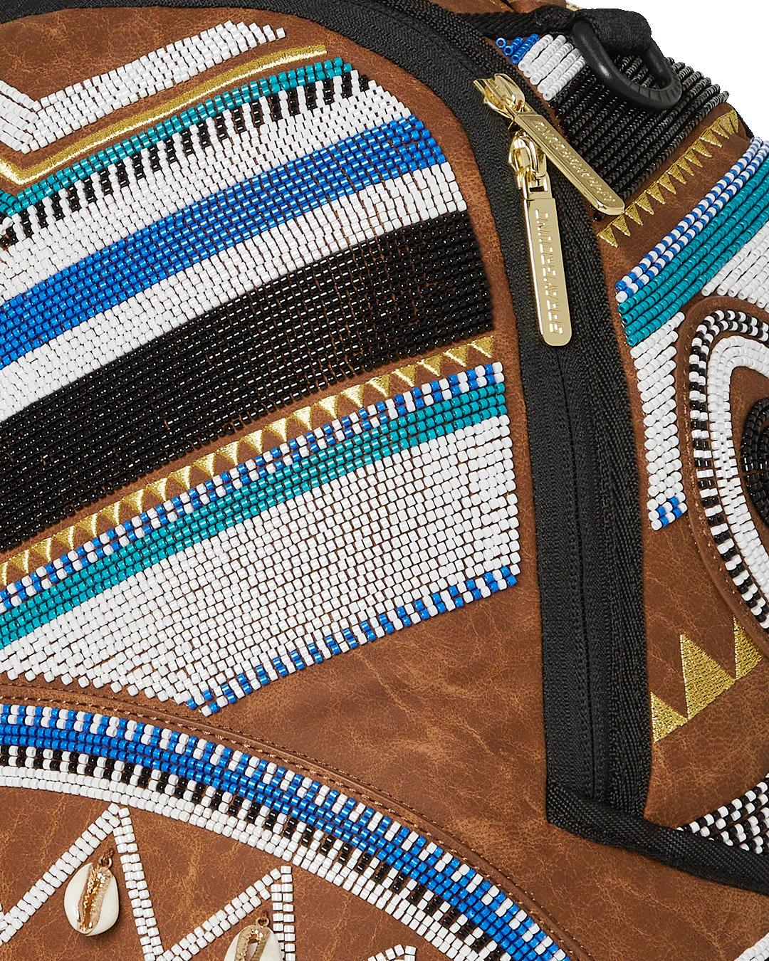Sprayground Trending | THE MET KUBA KINGDOM HEADDRESS BACKPACK